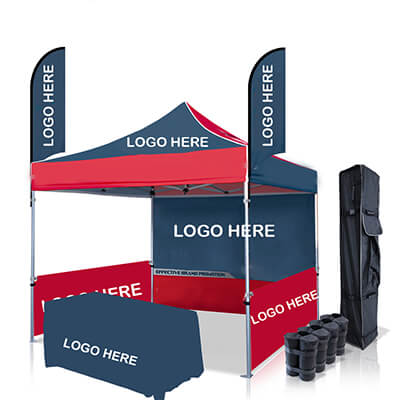 trade show tent booth with flags and tablecloth
